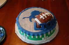 a football themed cake on a table