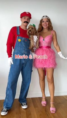 a man and woman in costumes posing for a photo