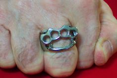 Stainless Steel Knuckle Men's Ring Description: Stainless Steel Brass Knuckles Ring Approx. Width: 17mm Approx. Weight: 11.1 grams Available Sizes: 9-16 We will ship out  A.S.A.P after we receive payment. Most Merchandise is Shipped within 24hrs(excluding weekends and Holidays) ...Accompanied with an Email/Tracking # to Customer. Shipments going to Canada must go thru Customs...Please allow for Extra Delivery Time. Attention: Buyers outside the U.S. are responsible for any and all import/custom charges (That may, or may not occur) You may need to pay, when you receive your item. If you have any questions or concerns please do not hesitate to contact us. If you are not satisfied with your purchase, we will gladly take the item back. You must contact us within 14 days."All Returns must be in Biker Rings Mens, Biker Rings, Knuckle Rings, Men's Jewelry Rings, Men's Ring, A P, You Must, Mens Jewelry, Jewelry Watches