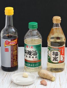 three different types of condiments on a table