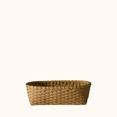 a woven basket is shown against a white background