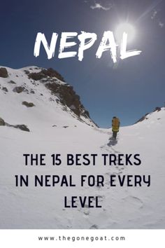 a person walking up a snow covered hill with the words nepal on it's side