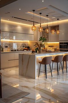 a modern kitchen with marble floors and lights