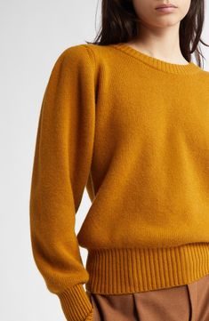 An ochre-inspired hue warms this sumptuous cashmere sweater knit with a neat Milano stitch. Crewneck Long sleeves Ribbed cuffs and hem 100% cashmere Hand wash, dry flat Made in the UK Designer Clothing Classic Yellow Sweater For Fall, Yellow Wool Sweater For Fall, Lambswool Sweater For Workwear In Fall, Fall Workwear Lambswool Sweater, Fall Lambswool Workwear Sweater, Fall Lambswool Sweater For Workwear, Fall Lambswool Sweater For Work, Lambswool Knit Sweater For Fall, Fall Lambswool Knit Sweater