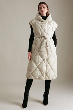 Cosy Up In Style With Our Snug Padded Gilet. Combining Quilted Panels With A Supersized Collar And Roomy Pockets, This Sleeveless Design Is The Perfect Luxe Layer To Add To All-Black Ensembles. Vest Ideas, Unconventional Fashion, Faux Fur Collar Coat, Biker Coat, Long Faux Fur Coat, Wrap Front Dress, Fur Collar Coat, Outer Women, Rib Knit Top