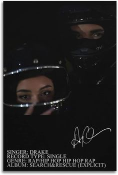 two people with helmets on their heads in the dark