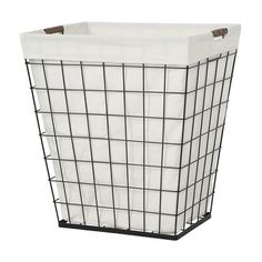 a large white basket with black wire on the bottom and sides, in front of a white background