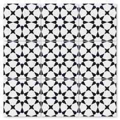 four black and white tiles with geometric designs on the bottom, one has an inverted design