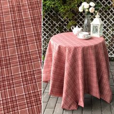 a table with a red and white checkered cloth on it, next to a photo of a vase filled with flowers