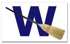 a broom with the letter w on it sitting in front of a white background and blue letters