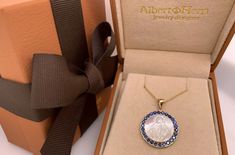 Express your devotion with classic elegance, timeless and radiant, with the Mother of Pearl Miraculous Gold & Gemstones Medal. Includes a beautiful chain (16 inch). Bordered with 1 carat high quality natural gems, this is a durable, authentic piece of genuine luxury. Surprise those who have become true blessings to you. Give them a gift of affection and protection. Handmade in 14 karats solid (plain) gold. 20mm diameter. What makes this piece ideal for you (or your special someone)? Handmade lux Luxury Surprise, Miraculous Medal, Mother Pearl, Handmade Gold, 14kt Gold, 1 Carat, Classic Elegance, Mother Of Pearl, Blue Sapphire