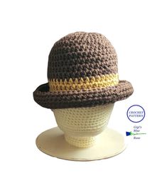 a crocheted hat on top of a mannequin head