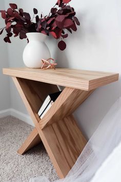 a wooden table with the words build this end table below it