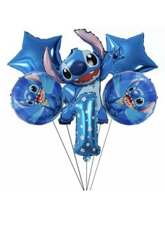 the balloon is shaped like an elephant and has five balloons attached to it with stars