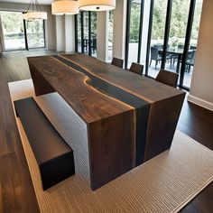 a large wooden table sitting in the middle of a room