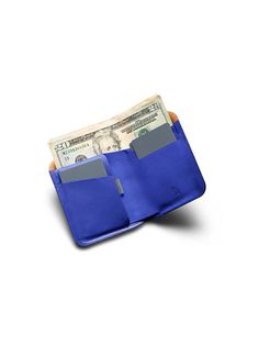 Our classic Note Sleeve billfold, reimagined with pre-molded leather, stitchless construction, and one-handed magnetic closure. To keep this wallet as slim as possible, we’ve joined the layers of leather using heat bonding, rather than bulky stitching. The snappy magnetic closure keeps your stuff secure, helps maintain a slim silhouette and feels incredibly satisfying! To balance access with capacity, we paired two quick-draw card slots, and two bulk storage pockets. The flat bill section is siz Modern Bifold Wallet With Hidden Phone Sleeve, Blue Trifold Wallet With Card Slots For Daily Use, Blue Trifold Wallet With Interior Card Slots, Blue Rfid Blocking Card Holder For Everyday, Classic Blue Trifold Wallet For Everyday Use, Blue Leather Trifold Wallet With Card Slots, Blue Trifold Wallet With Rfid Blocking For Everyday Use, Blue Rectangular Trifold Wallet For Everyday Use, Blue Rectangular Trifold Wallet With Card Slots