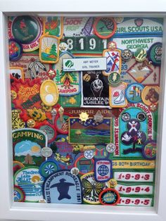 a white frame with patches and numbers on it