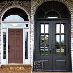 two double doors with sidelights and windows on the outside of a brick building in front of an entryway