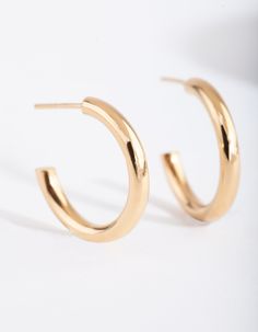 Description
These gold plated sterling silver hoop earrings boast a thick design. They are the perfect addition to any simple outfit.

Size: 108mm (L) x 108 (W)
Weight: 1.02g (one earring) Lovisa Earrings, Lovisa Jewellery, Fashion Jewellery Online, One Earring, Gemstone Drop Earrings, Bold Earrings, Simple Outfit, Sterling Silver Hoop Earrings, Green Gemstones