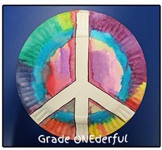 a paper plate with a peace sign painted on it and the words grade onederful