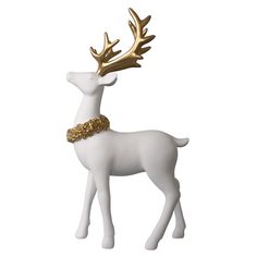 a white and gold reindeer figurine on a white background