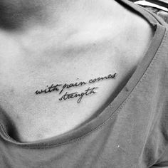 a black and white photo of a woman's chest with the words written on it