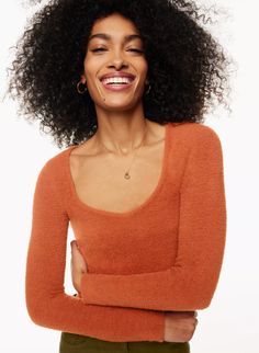 HUSH KNIT SWEETHEART SWEATER | Aritzia Aritiza Sweater, Aritzia Style, Sweater Aritzia, Sweat Vest, Chenille Yarn, Flare Top, Fully Fashioned, Deep Neckline, Cargo Pant