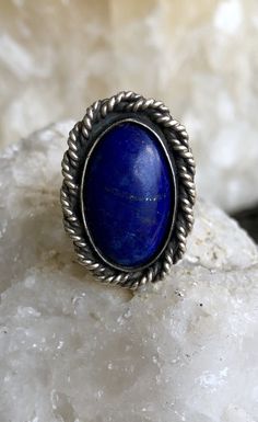 Sterling Silver Blue Lapis Lazuli Native American Vintage Ring Face of ring measures over 1 inch tall Ring size 8 Oval Nickel-free Blue Turquoise Ring, Adjustable Blue Crystal Gemstone Ring, Blue Large Stone Ring Jewelry, Adjustable Blue Rings With Large Stone, Blue Bohemian Jewelry With Metal Ring, Bohemian Blue Ring With Large Stone, Handmade Adjustable Blue Sapphire Ring, Handmade Adjustable Blue Crystal Ring, Bohemian Blue Jewelry With Metal Ring