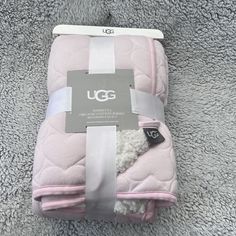 Ugg Baby Quilt Organic Cotton Jersey Sherpa Pink Hearts Reversible Blanket New Condition: New With Tags Size: 36 In X 45 In Color: Pink Shell Shipped As Soon As Possible. Bundle & Save! Pink Ugg Blanket, Ugg Blanket, Coquette Blanket, Blanket Coquette, Ugg Bedding, Burr Basket, Crib Quilts, Pink Uggs