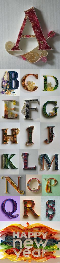 the letters are made out of paper and have different shapes, sizes, and colors