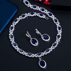 If you’re looking for a fine jewelry which looks sepecial,   precious stone please  consider cubic zirconia in crystal jewerly set which suitble for Wedding Jewelry Set. Sapphire Diamond Jewelry Sets For Gift, Sapphire Diamond Jewelry Sets As Gifts, Sapphire Cubic Zirconia Jewelry Sets, Formal Sapphire Crystal Jewelry Sets, Fine Jewelry Sets With Diamonds In Blue, Elegant Blue Crystal Jewelry Sets, Blue Diamond Jewelry Set With Sparkling Stones, Blue Cubic Zirconia Fine Jewelry Sets, Blue Elegant Cubic Zirconia Necklace