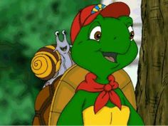 a cartoon turtle wearing a red bandana and holding a snail on its back while standing next to a tree