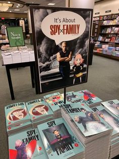 there are many books on display in the library and it's about spy - family