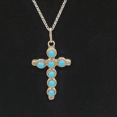 This beautiful cross pendant feature a petitpoint turquoise design and delicate sterling silver work.  It is strung on  delicate sterling silver chain, making this gorgeous cross a lovely statement piece.   This religious necklace would make a great gift for mom, gift for daughter, gift for friend or gift for girlfriend.   Also, please check out the other listings in my Etsy shop to find the perfect ring, bracelet and necklace to complete your look! Spiritual Turquoise Jewelry Stamped 925, Bohemian Blue Cross Jewelry, Bohemian Turquoise Cross Jewelry, Handmade Southwestern Cross Necklace, Spiritual Cross Turquoise Necklace For Gift, Spiritual Silver Turquoise Necklace Nickel Free, Spiritual Turquoise Cross Necklace For Gift, Spiritual Turquoise Cross Necklace As Gift, Bohemian Blue Cross Pendant Necklace