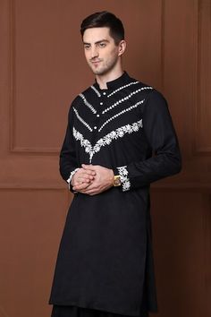 Black kurta with thread embroidered floral jaal and geometric patterns. Comes with a pathani. - Aza Fashions Black Embroidered Sherwani Straight Kurta, Designer Black Cotton Sherwani, Traditional Black Sherwani With Floral Embroidery, Black Cotton Sherwani For Festive Occasions, Festive Black Cotton Sherwani, Black Cotton Sherwani With Straight Kurta Shape, Black Cotton Sherwani Straight Kurta, Black Chikankari Embroidery Kurta For Eid, Black Chikankari Embroidery Kurta For Transitional Season