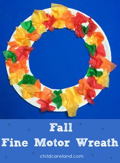 a paper wreath made out of tissue paper with the words fall tissue paper wreath on it