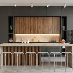 a modern kitchen with an island and bar stools