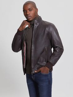 A luxe genuine-leather jacket with a soft feel features a mock neckline, long sleeves, front zip pockets and ribbed trim. Complete with interior pockets, a printed lining and zip-up closure. Winter Leather Jacket With Zip Fly And Stand Collar, Winter Leather Jacket With Stand Collar And Zip Fly, Winter Leather Jacket With Zipper Pocket, Luxury Leather Jacket With Zipper For Fall, Brown Turtleneck Outerwear For Spring, Winter Business Leather Jacket With Zipper Closure, Winter Business Leather Jacket With Zipper, Winter Leather Jacket With Zipper For Business, Classic Leather Jacket With Ribbed Collar For Fall