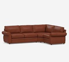 a brown leather sectional sofa with the corner chaise lounger facing it's left