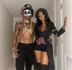 a man and woman dressed up for halloween