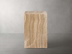 a wooden block sitting on top of a table