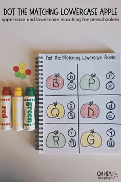 an apple themed dot the matching lowercase and lowercase alphabet game with crayons