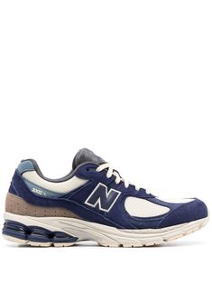 suede logo-patch sneakers from NEW BALANCE featuring navy blue, cream white, calf suede, logo patch to the side, panelled design, logo-embroidered tongue, front lace-up fastening and rubber sole. Navy Sneakers With Vibram Sole For Streetwear, Sporty Navy New Balance Sneakers, Classic Blue New Balance Sneakers, Classic Navy New Balance Sneakers, Navy New Balance Sneakers With Round Toe, New Balance Navy Round Toe Sneakers, New Balance Suede, New Balance 2002r, Logo Azul