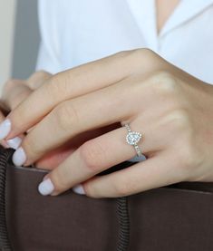 PRODUCT DETAILS Stone Carat Number Color Clarity Shape Diamond 1 0.42 1 F SI2 Pear Diamond 2 0.25 20 F SIg Round Total Weight: 2.48 gr Material: 14K Gold Solitaire Diamond Ring, Solitaire Diamond, Pear Diamond, Diamond Solitaire Rings, Pear Cut, Diamond Solitaire, Diamond Ring, Pear, Engagement Rings