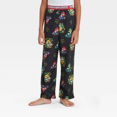 Bring Mario-inspired style to your kid's closet with the Mario Kart Pajama Pants. These black pajama pants feature an allover print of Mario Kart and Super Stars along with a red waistband with the title "MARIO KART" running across it. Made from soft and lightweight fabric, these regular-fit pajama pants are great to mix and match with their favorite sleep shirts. Black Pajama Pants, Black Pajamas, Kid Closet, Footie Pajama, Kids Clothes Boys, Mario Kart, Pajama Robe, Sleep Shirt, Suit Shop