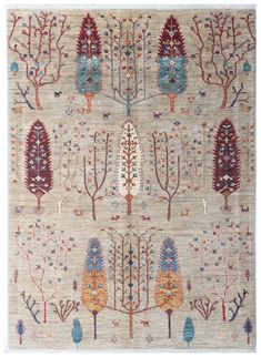 an old rug with trees and flowers on it