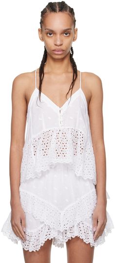 Organic cotton broderie anglaise camisole. Cutouts and embroidered detailing throughout. · Plunging V-neck · Four-button placket · Cropped peplum hem · Fixed shoulder straps · Racer back Supplier color: White Summer Eyelet V-neck Blouse, Summer V-neck Eyelet Blouse, Summer V-neck Top With Broderie Anglaise, Feminine Summer Tops With Eyelet Details, V-neck Broderie Anglaise Top, Cotton Eyelet V-neck Top, Feminine Eyelet Tops For Summer, Summer Daywear Lace Top Camisole, Summer V-neck Top With Eyelet Detail