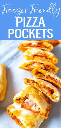 pizza pockets with cheese and meat on them