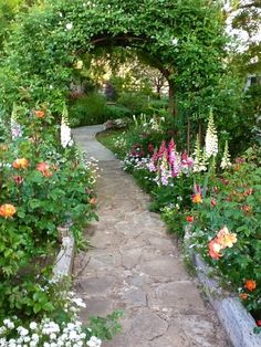 an instagram page on pinterest with flowers and plants in the garden area