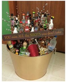 a metal bucket filled with lots of bottles